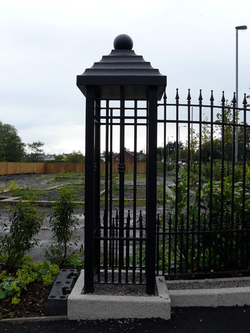 Architectural Wrought Iron Railings with Tiered Cap Cage Pillars