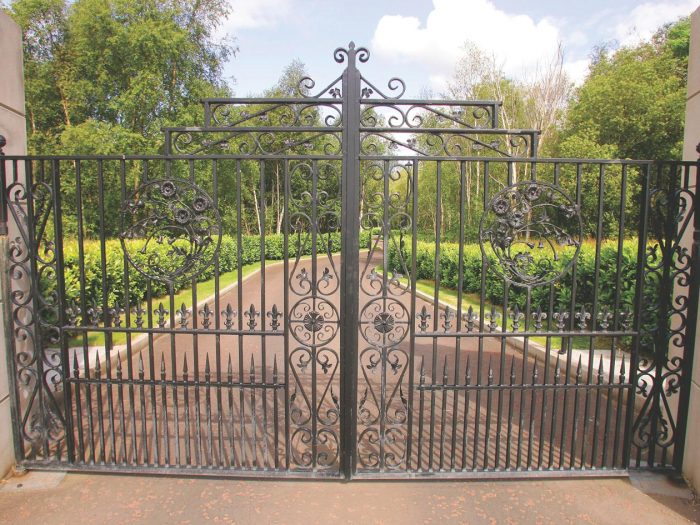 Elegant Bow-Top Wrought Iron Double Gates