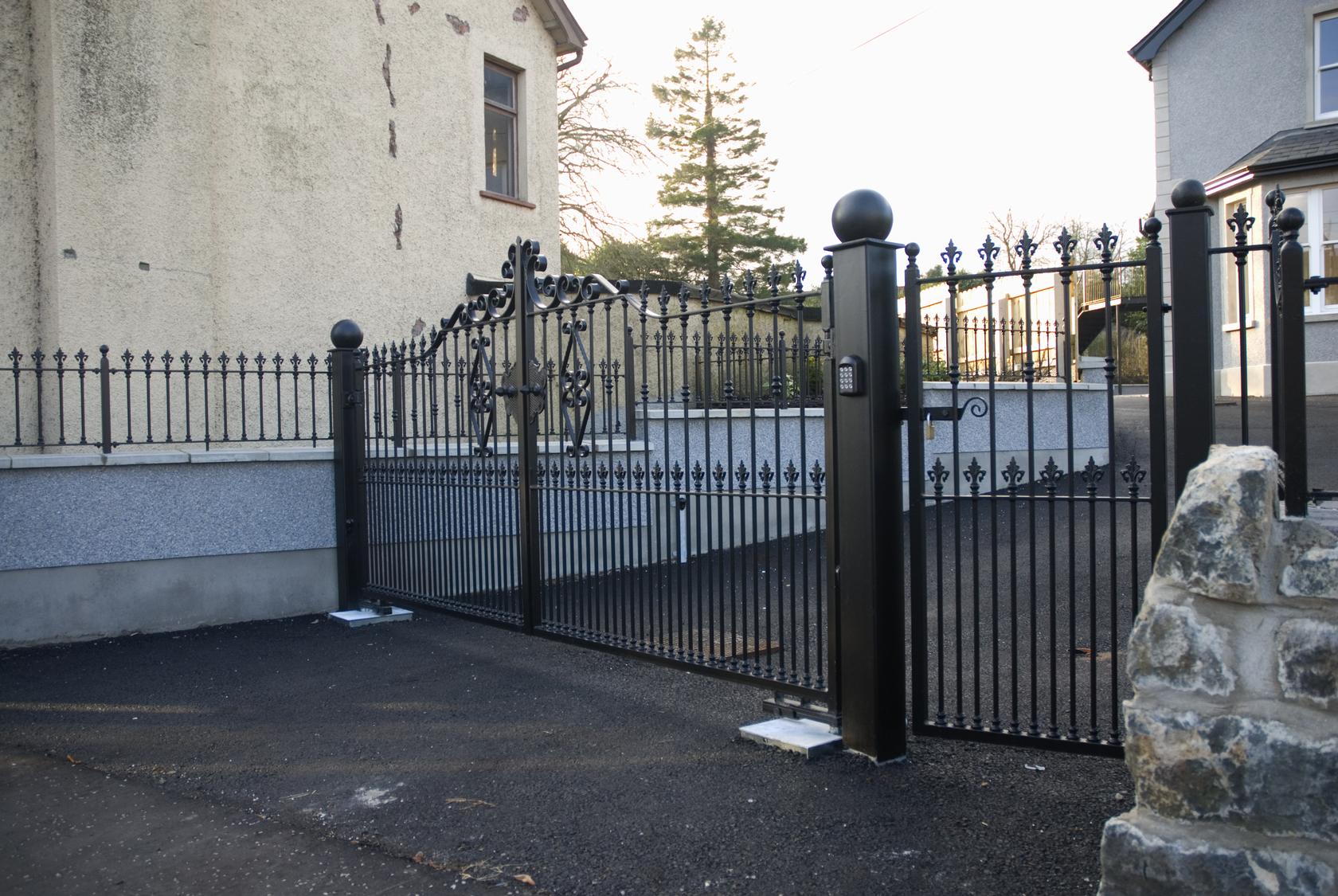 Decorative Wrought Iron Driveway Gates and Matching Side Gate