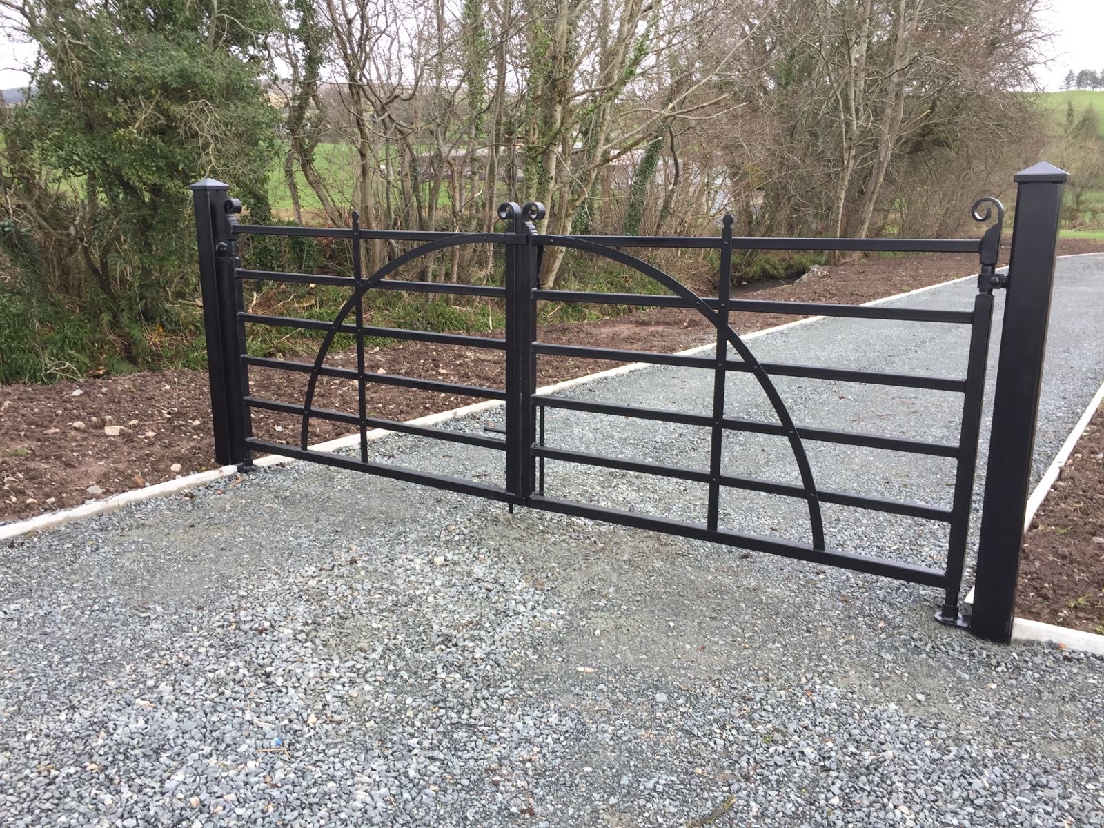 Minimalist Arched Steel Field Gates