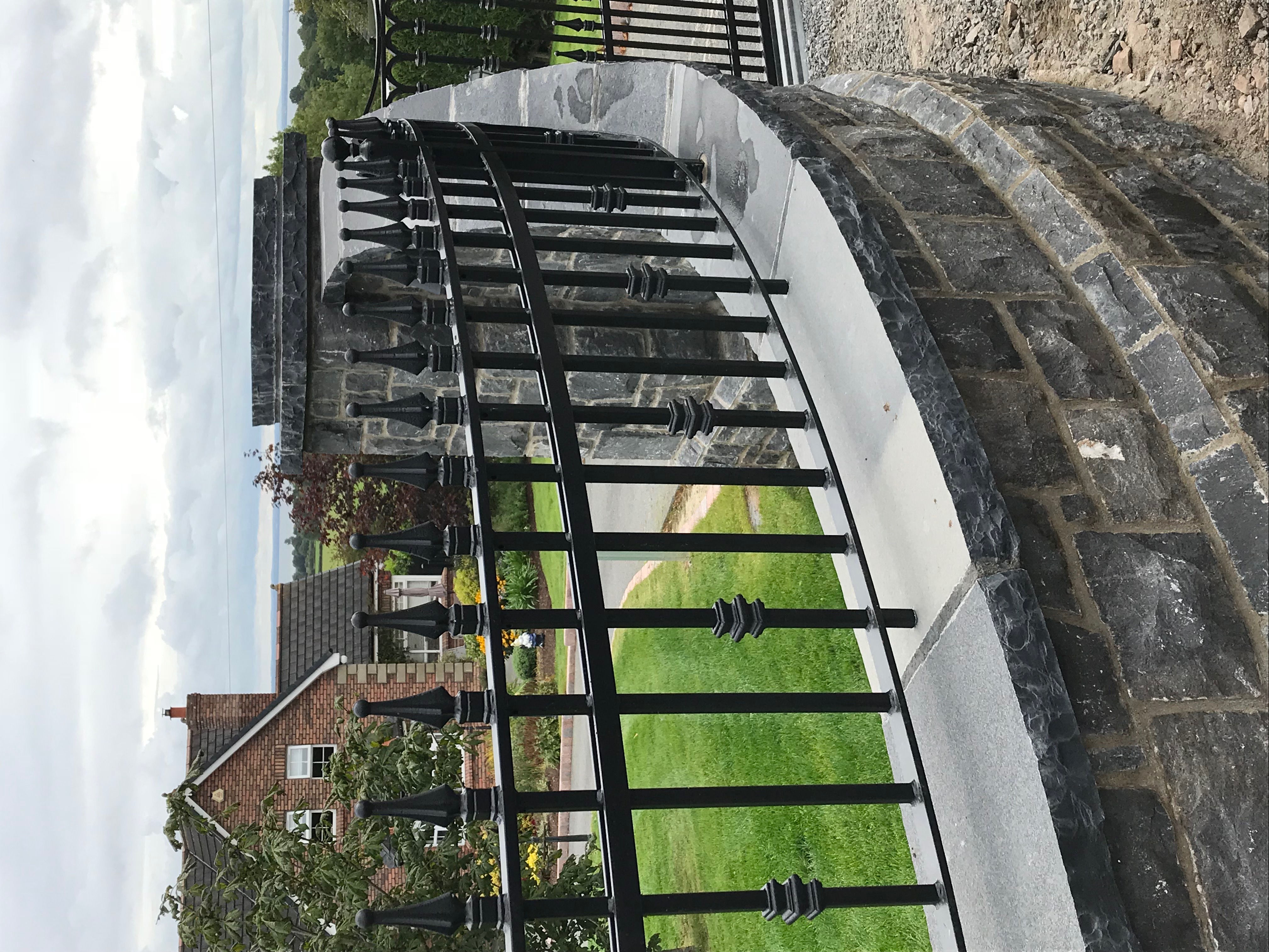 Detailed Wrought Iron Railing with Tapered Finials