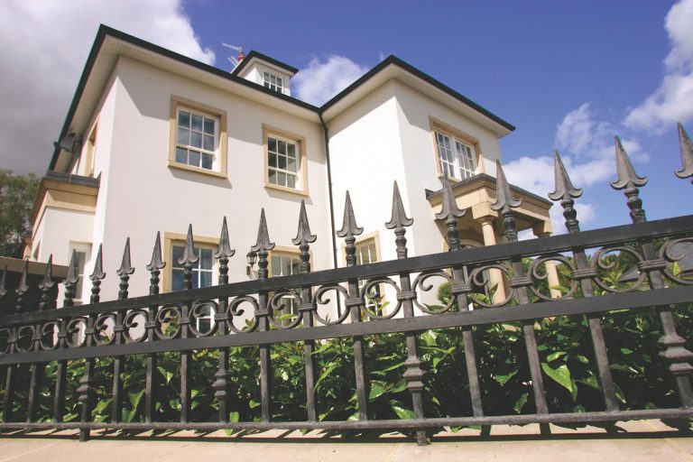Regency-Style Wrought Iron Railings with Ornate Scrollwork