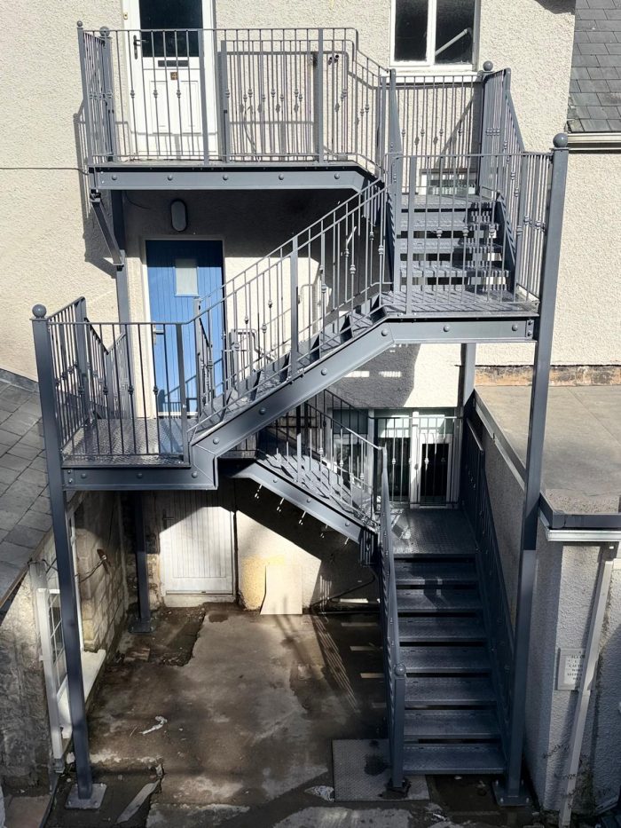 Multi-Tier External Steel Fire Escape with Decorative Balustrades