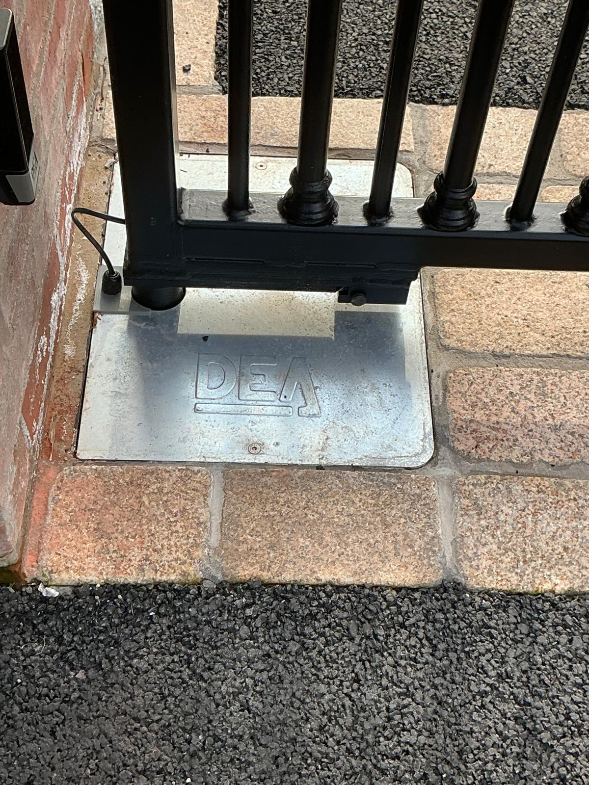 Automated Iron Gates with Brick Pillars and Intercom Access