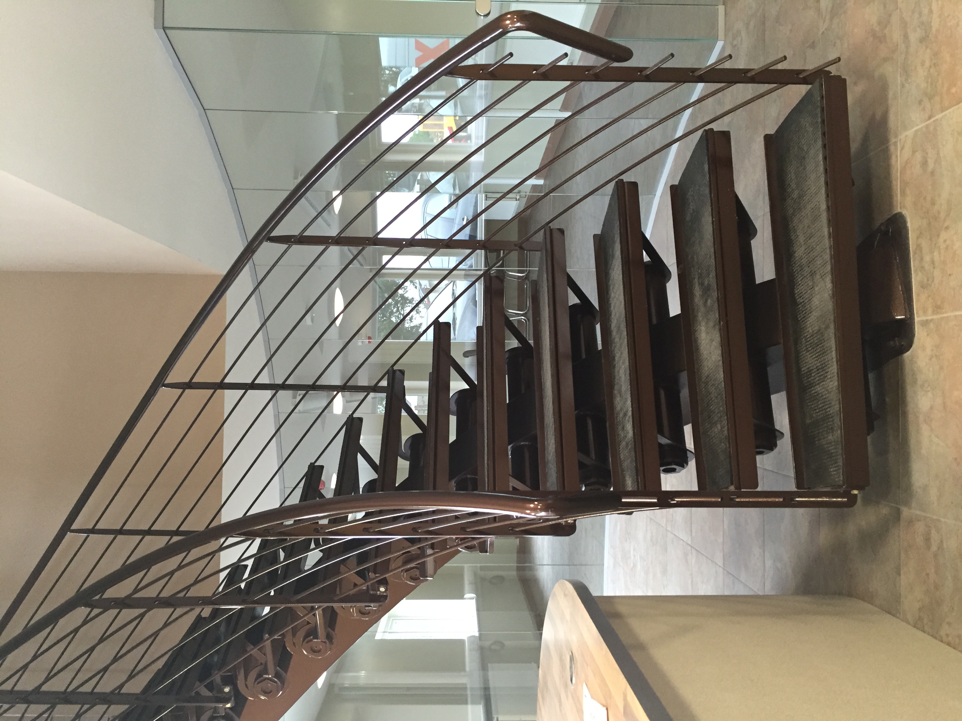 Modern Industrial Spine-Beam Curved Staircase