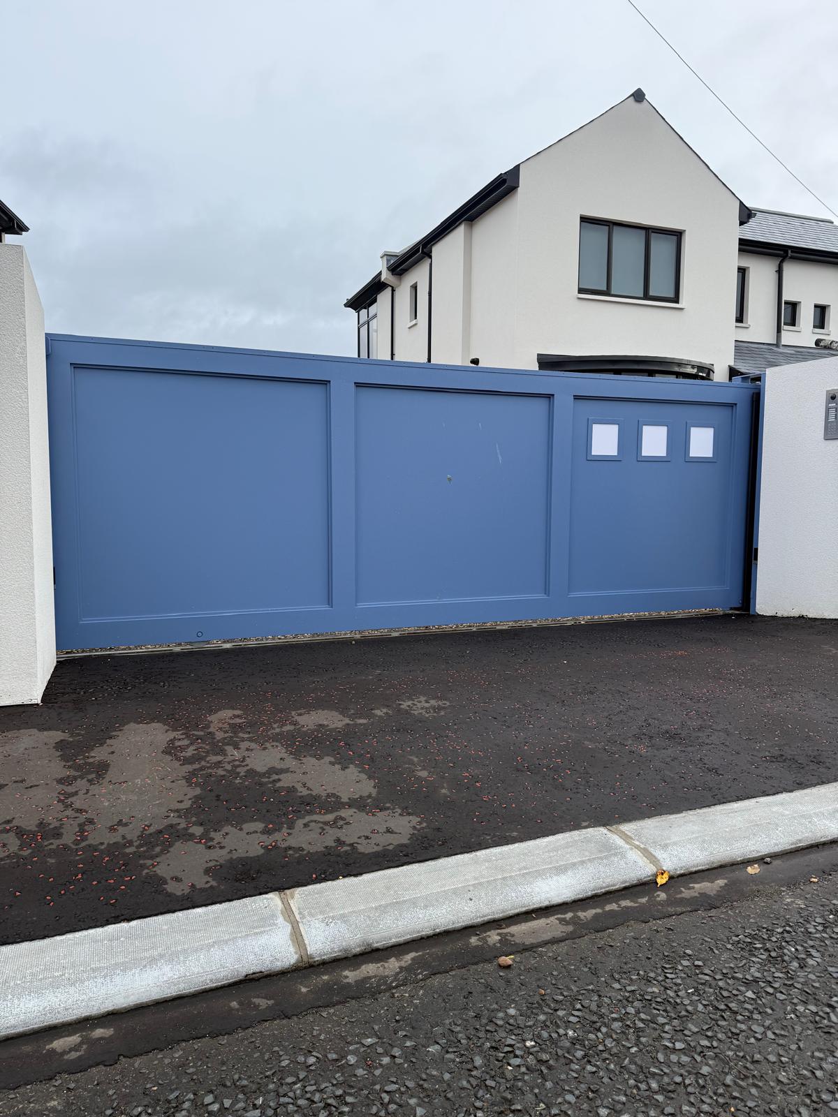 Automated Sliding Aluminium Gate with Contemporary Panel Design